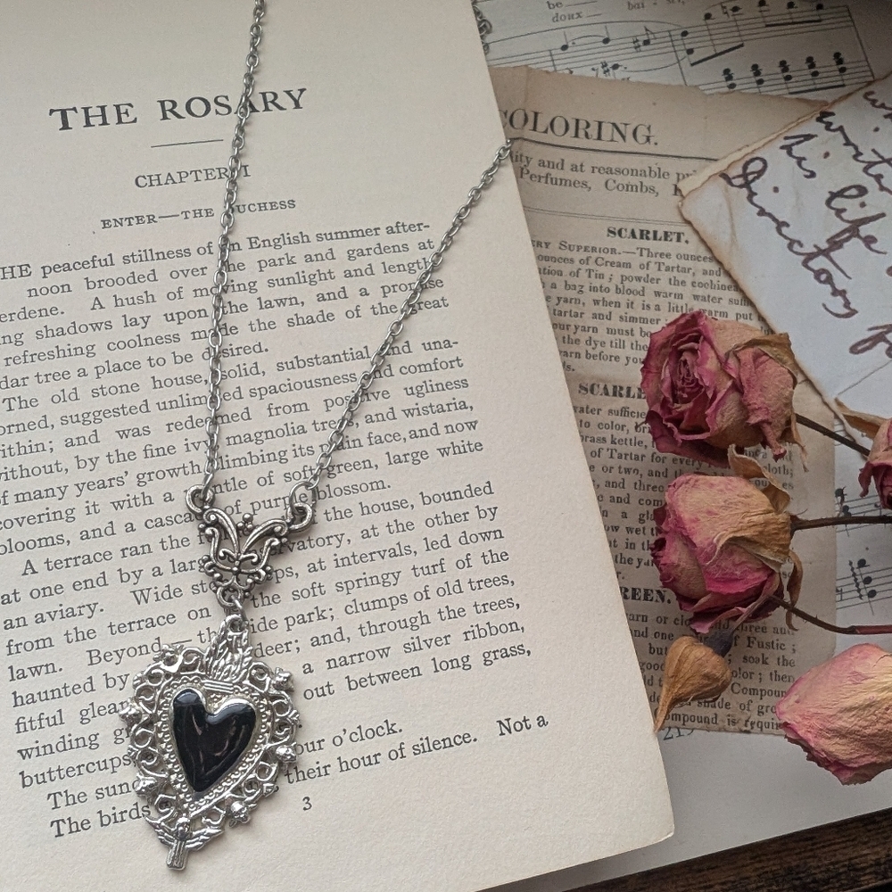 Silvertone Sacred Heart Pendant Necklace with Black Stone